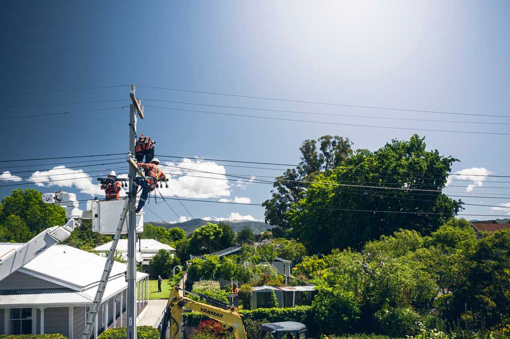 Contractor up power pole