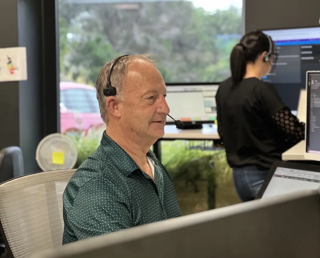 man on phone in call centre